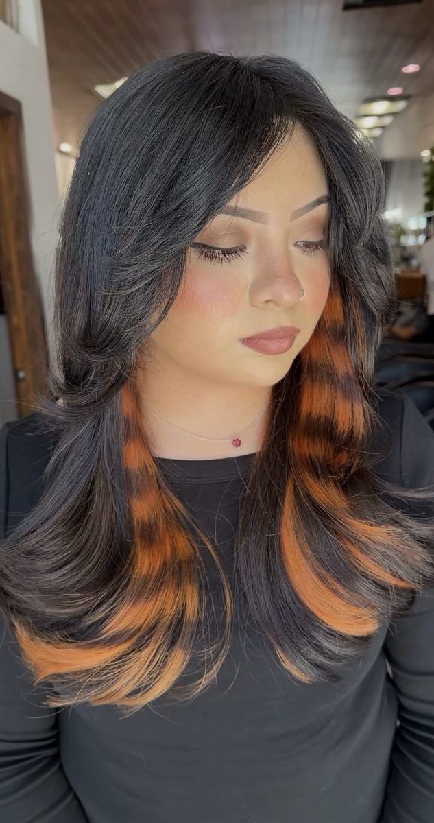 Black hair with copper leopard print color at Ra'pôr Salon in Costa Mesa