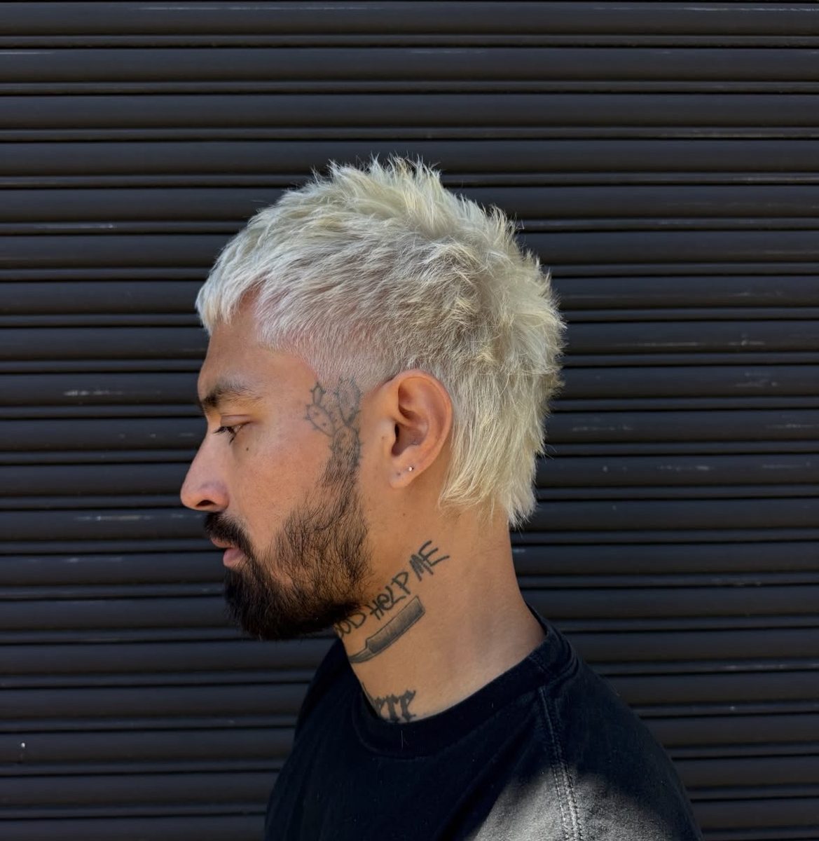 Platinum blonde textured crop with tapered sides, cut and colored at Ra'pôr Salon and Barber on Newport Blvd, Costa Mesa