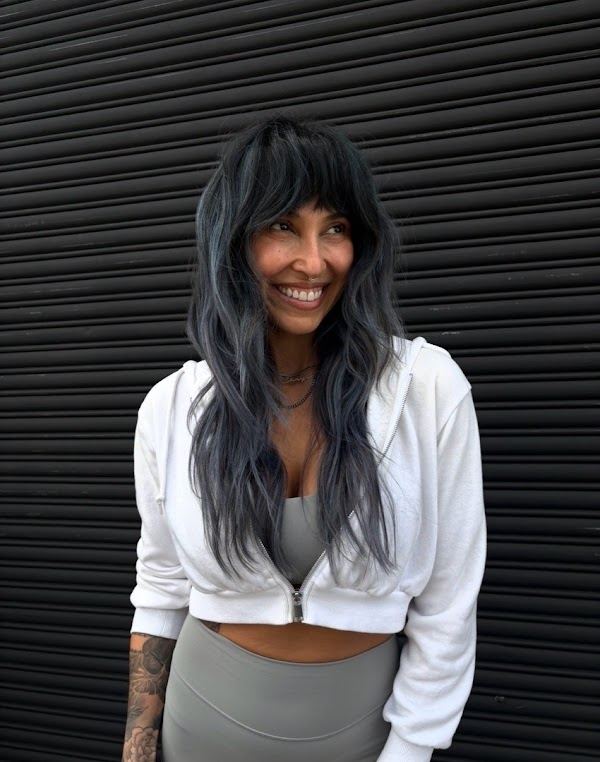Smoky blue wolf cut with bangs at Ra'pôr Salon in Costa Mesa